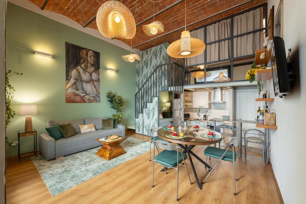 Ruang duduk di Via Cimabue 8b - Florence Charming Apartments - Metropolitan Loft in Florence - 20 minute walk to city center - excellent base for exploring - less than 5 minute walk to the supermarket - amazing bakery on the corner