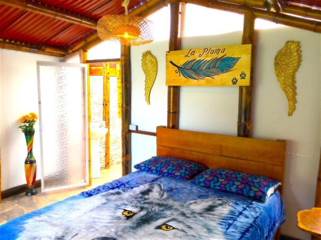 Postel nebo postele na pokoji v ubytování Ecolodge El Puente