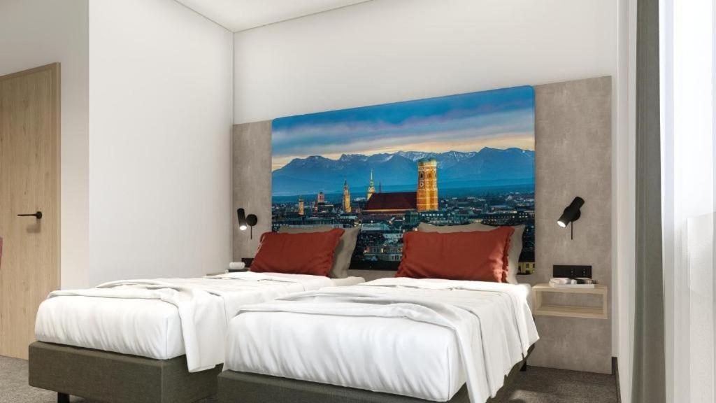 two beds in a bedroom with a view of a city at C & N Hotel - an der Messe München in Munich