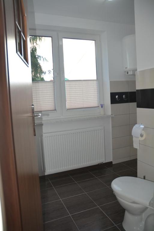 Kúpeľňa v ubytovaní Pokoje Gościnne u Agaty