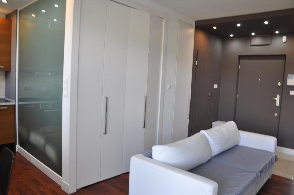 Posedenie v ubytovaní Apartament Mokotow