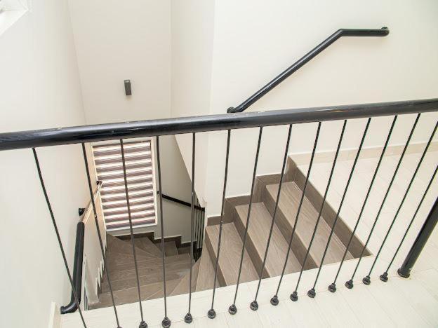 a staircase in a building with a stair railing at SERENE HAVEN RETREAT in Accra