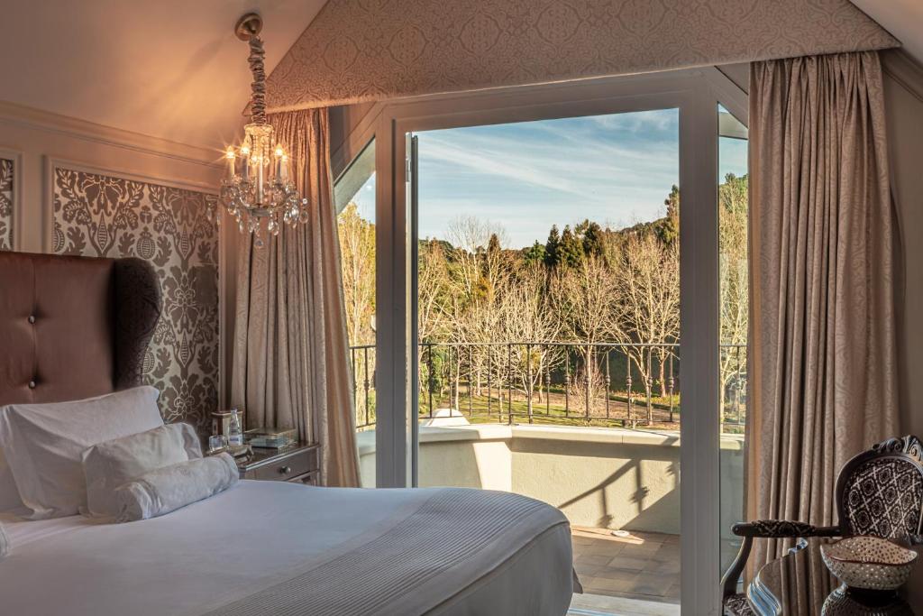 Postel nebo postele na pokoji v ubytování Castelo Saint Andrews