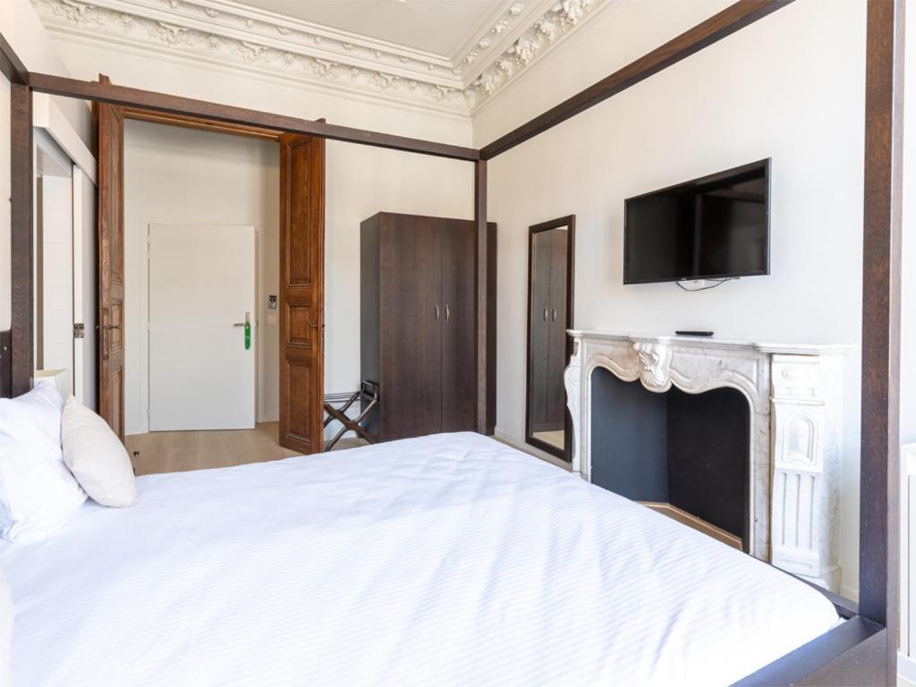 TV a/nebo společenská místnost v ubytování Lace Hotel