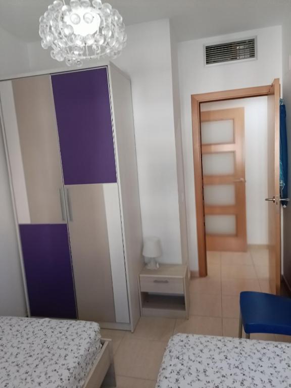 Postel nebo postele na pokoji v ubytování Piso Andrea