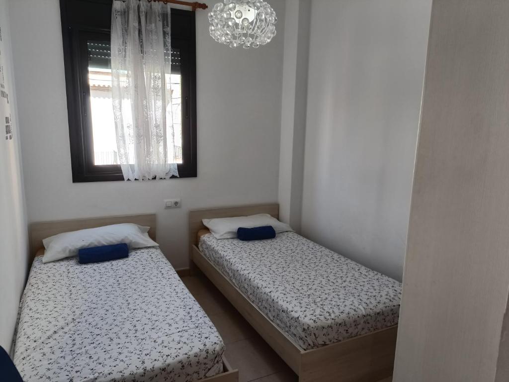 Postel nebo postele na pokoji v ubytování Piso Andrea