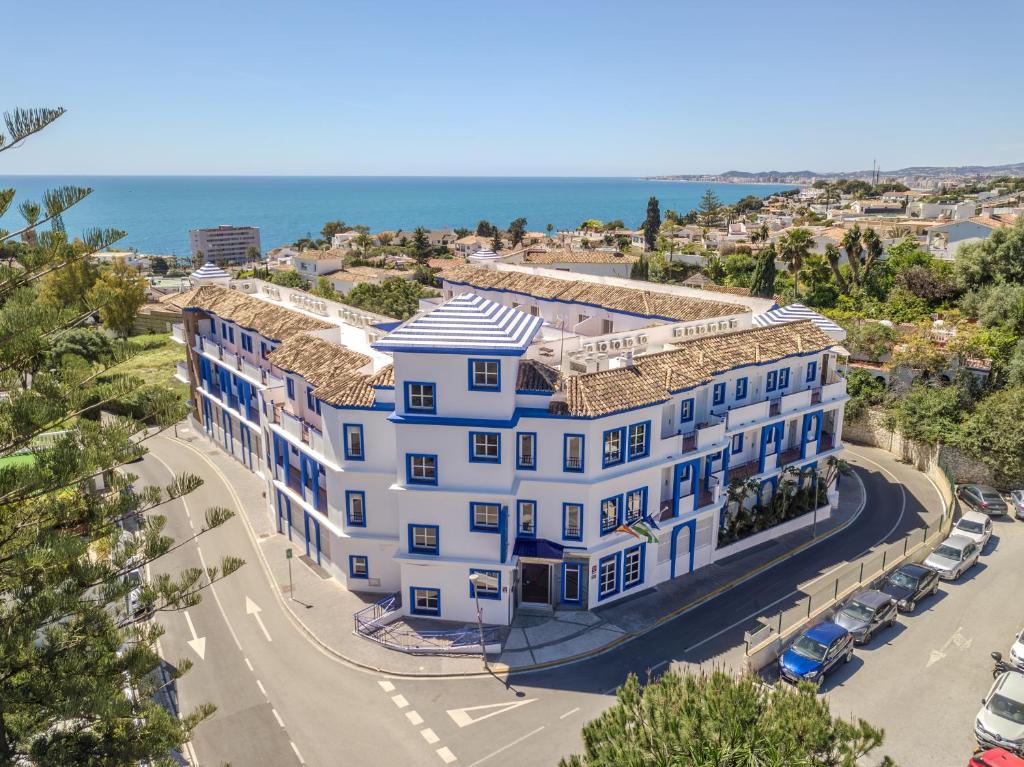 an aerial view of a building with the ocean in the background at Vive Costa Azul in Benalmádena