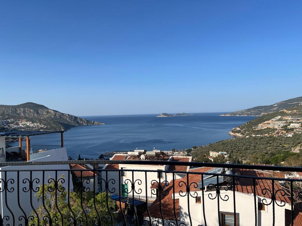 a view of the ocean from a balcony at Villa Deniz in Kalkan