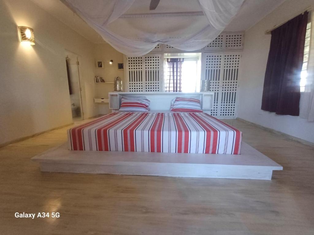 Postel nebo postele na pokoji v ubytování Ocean zuri villa