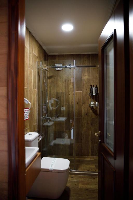 Koupelna v ubytování Hotel Pashai