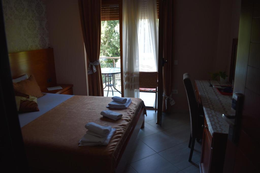 Postel nebo postele na pokoji v ubytování Hotel Velkom