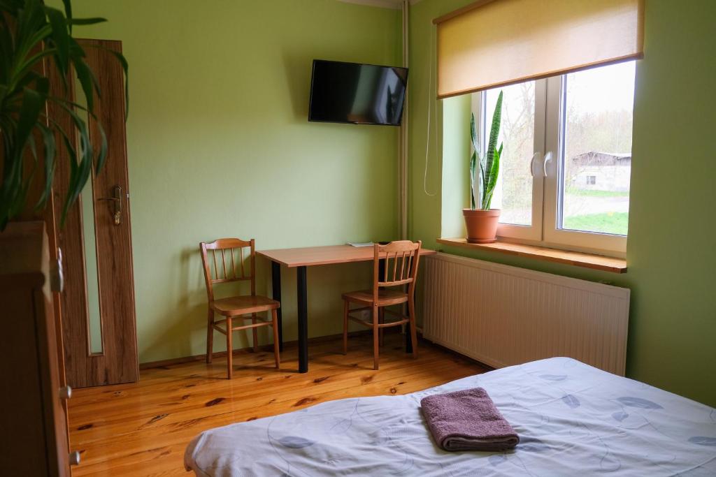 Posteľ alebo postele v izbe v ubytovaní Pokoje u Ani