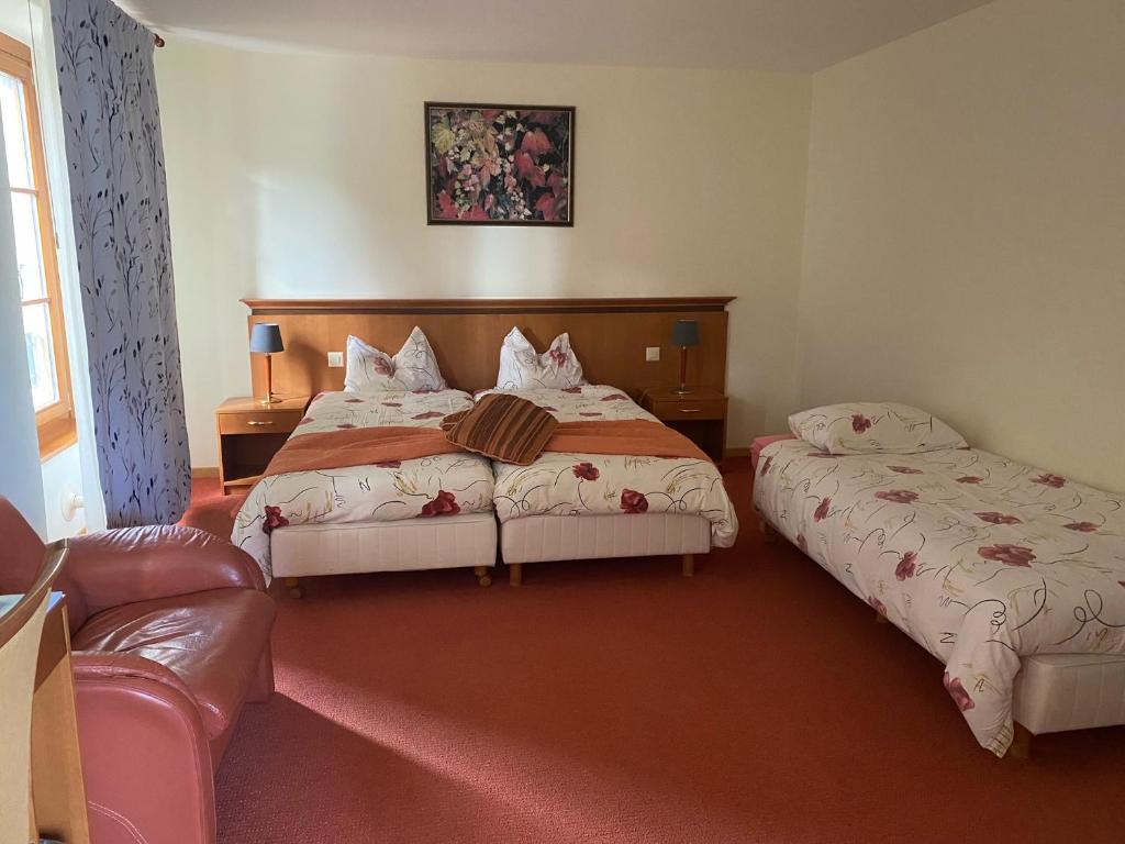 Postel nebo postele na pokoji v ubytování Auberge de Gilly SA