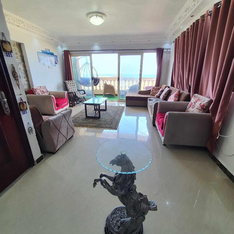 Sea and Montaza Palace view 2 bedrooms apartment alexandria,2 full bathrooms, with 2 AC and 1 Stand Fan, free wifi , available all year days with 3 heavy blankets - 7