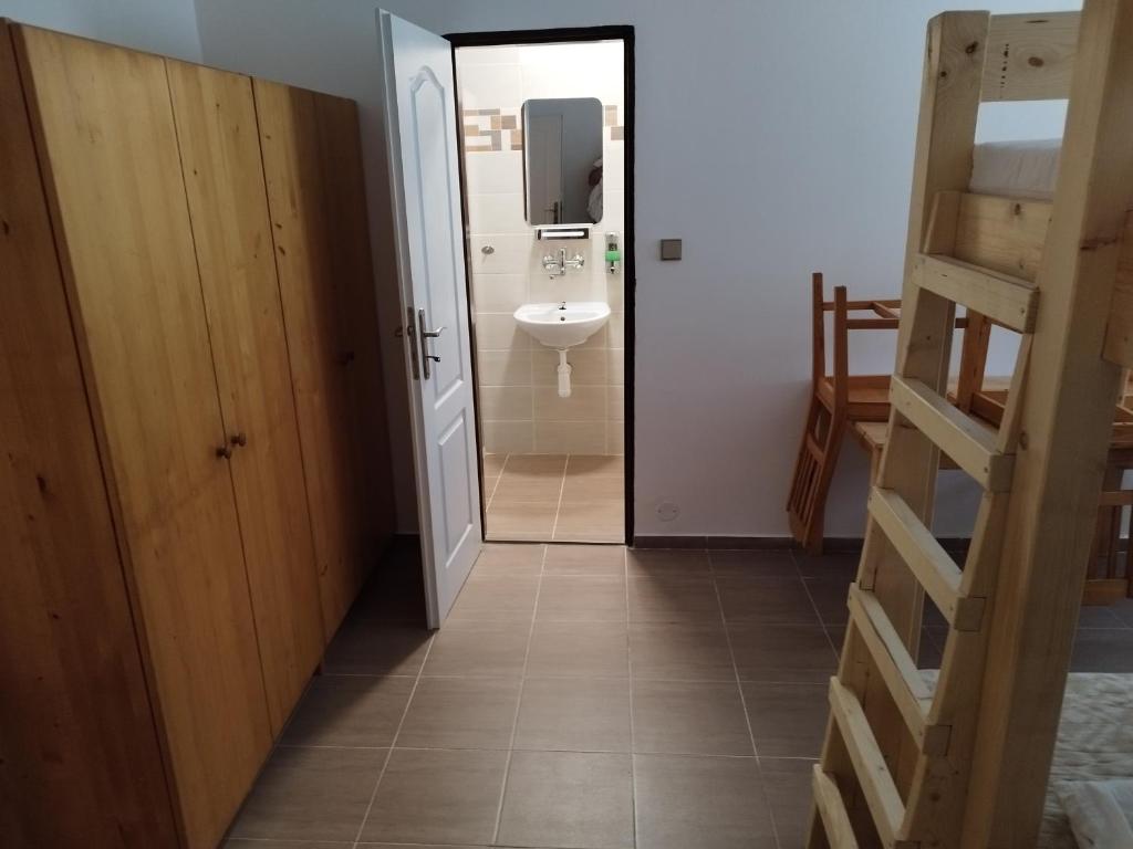 Postel nebo postele na pokoji v ubytování Penzion U Lipna