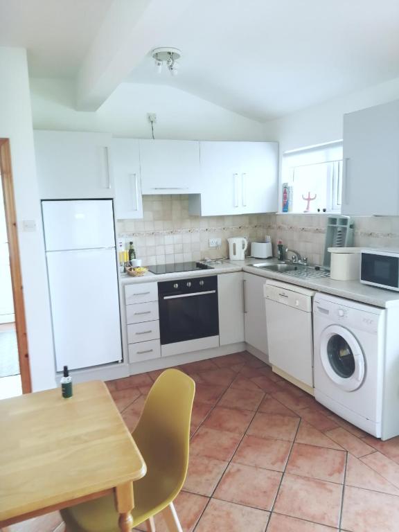 Kuchyň nebo kuchyňský kout v ubytování Carolina Cottage
