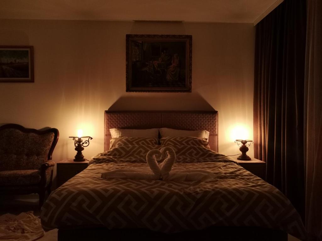 Кровать или кровати в номере In Apartments AirPort