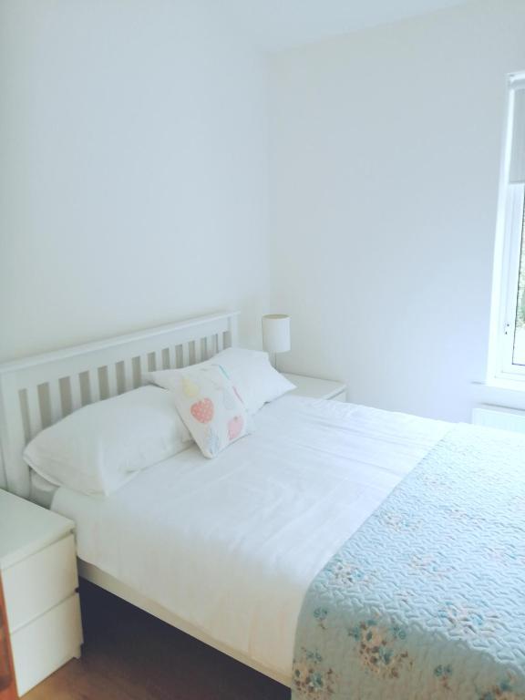 Postel nebo postele na pokoji v ubytování Carolina Cottage