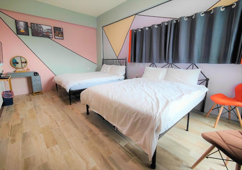 Postel nebo postele na pokoji v ubytování Sofa Potato Homestay