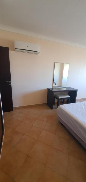 Postel nebo postele na pokoji v ubytování KABILA VISTA n3