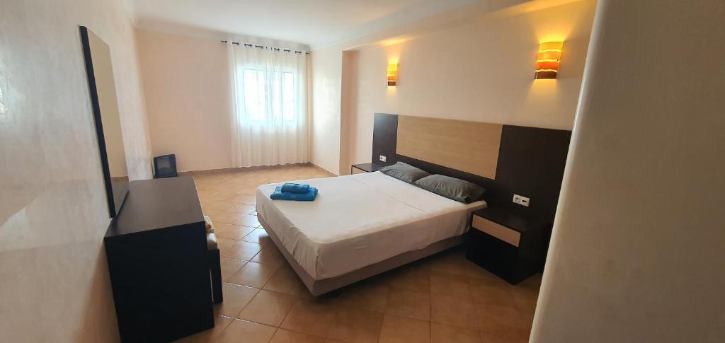 Postel nebo postele na pokoji v ubytování KABILA VISTA n3
