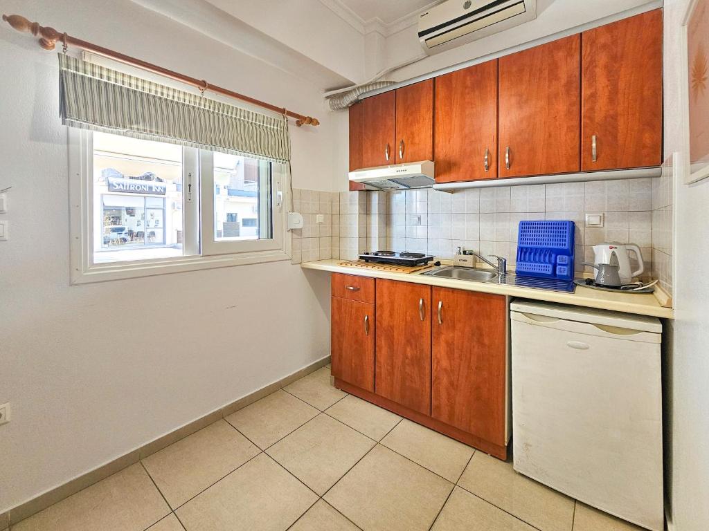Kuchyň nebo kuchyňský kout v ubytování Hotel Exarhos