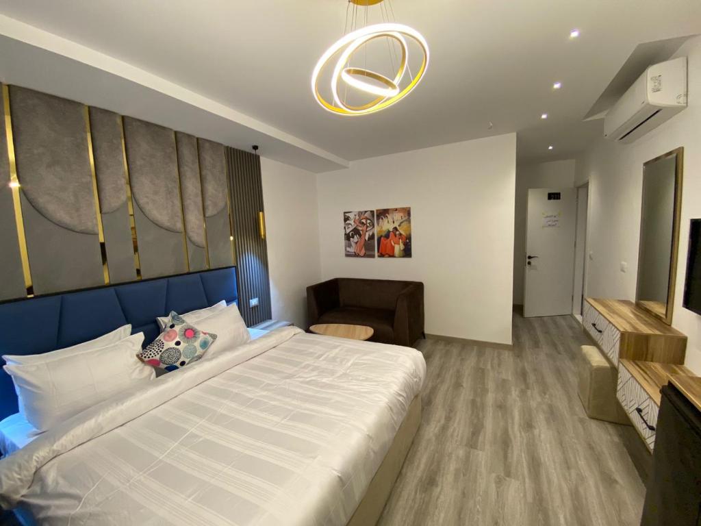 Postel nebo postele na pokoji v ubytování Elite Pyramids Boutique Hotel