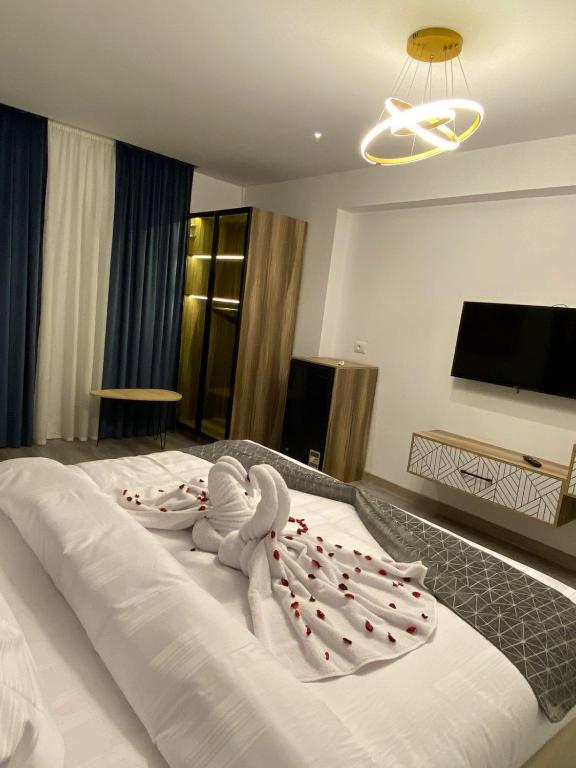 Postel nebo postele na pokoji v ubytování Elite Pyramids Boutique Hotel