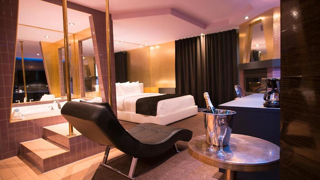 Postel nebo postele na pokoji v ubytování Hôtel Le Rivage