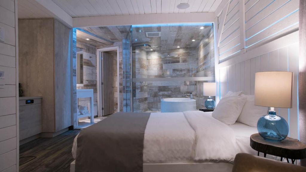 Postel nebo postele na pokoji v ubytování Hôtel Le Rivage
