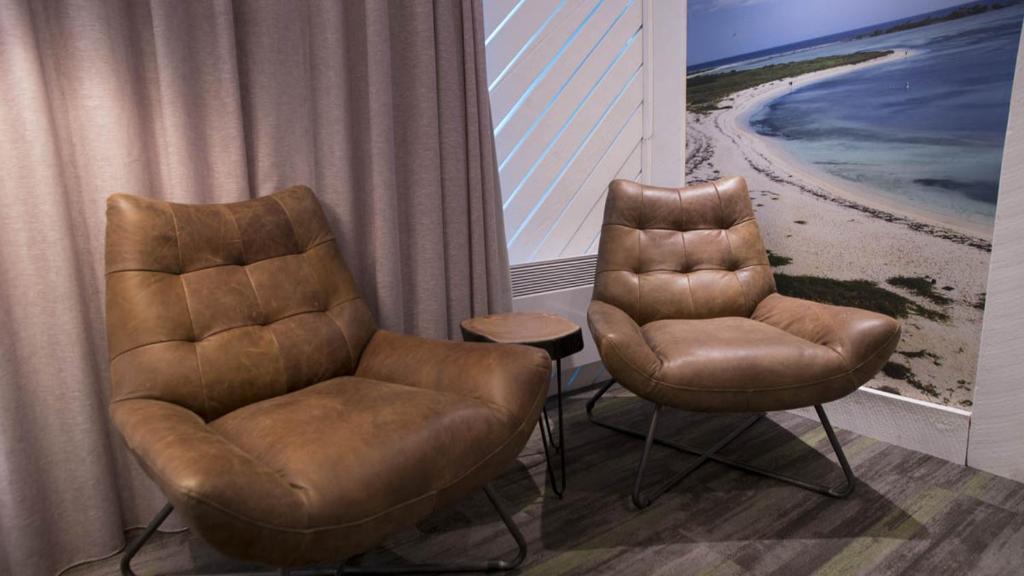 Posezení v ubytování Hôtel Le Rivage