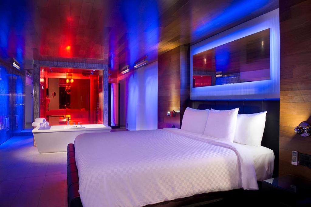 Postel nebo postele na pokoji v ubytování Hôtel Le Rivage
