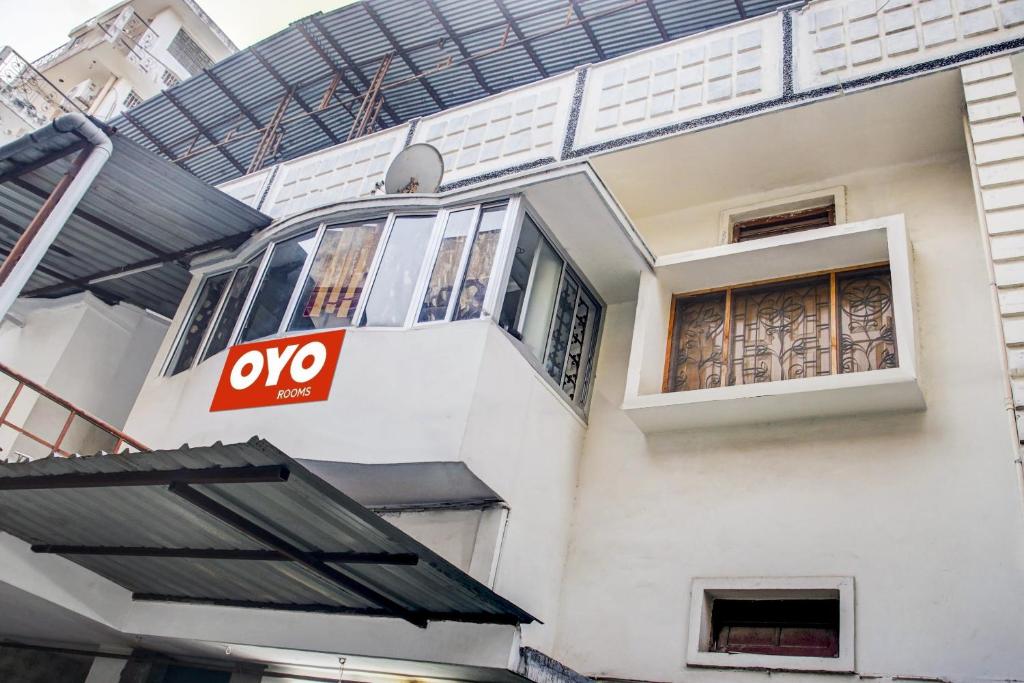 a building with a ovo sign on the side of it at OYO Hotel Triveni. in Patna