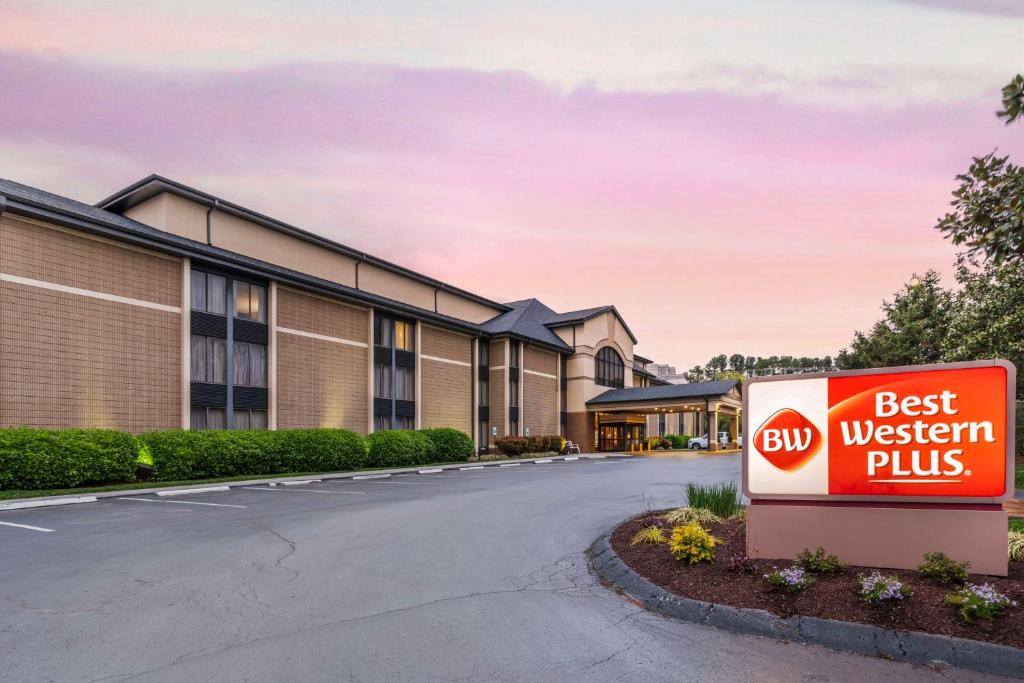 a best western plus sign in front of a building at Best Western Plus Knoxville Cedar Bluff in Knoxville