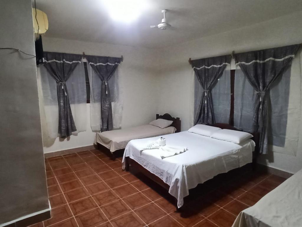 a bedroom with two beds in a room at cccc in Rurrenabaque