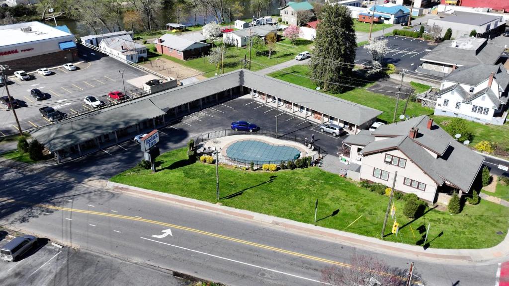 an aerial view of a house with a swimming pool at Relax Inn - Bryson City in Bryson City