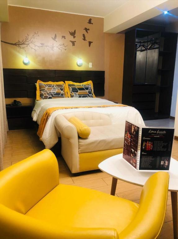 Postel nebo postele na pokoji v ubytování LOS ARCES HOTEL