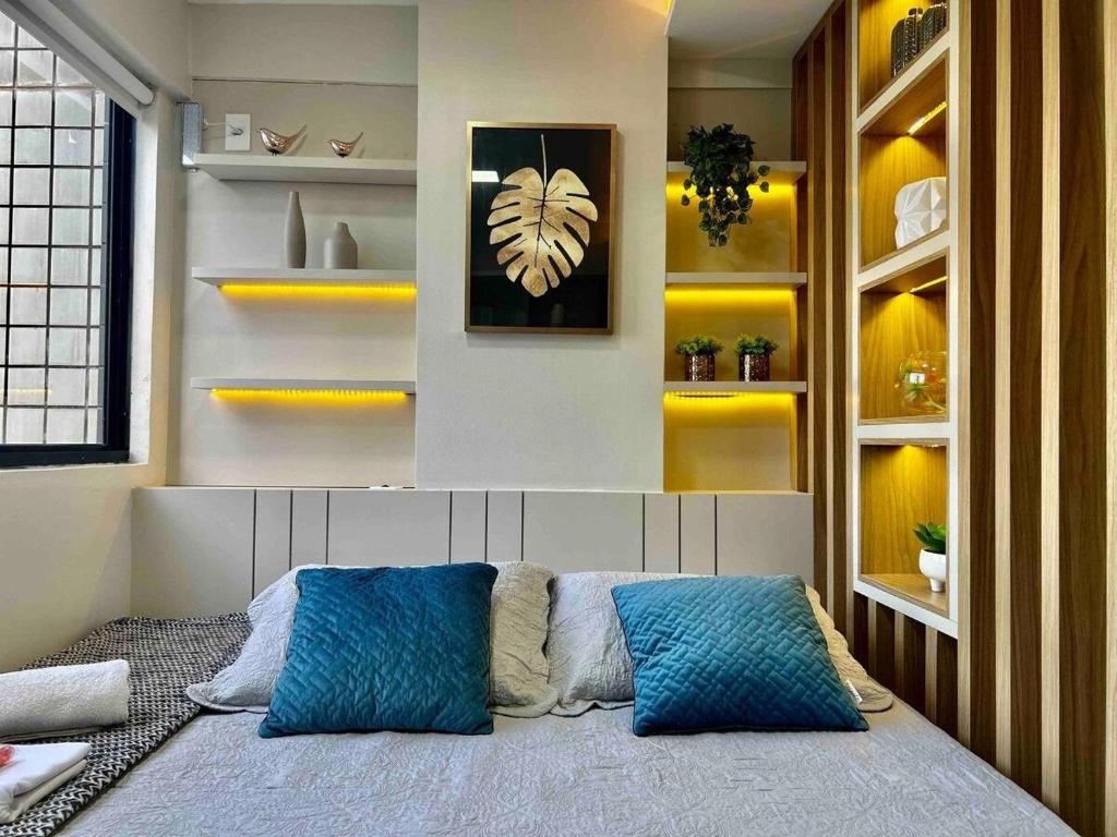 En eller flere senger på et rom på (208) Charmoso Studio - Perto da Praia