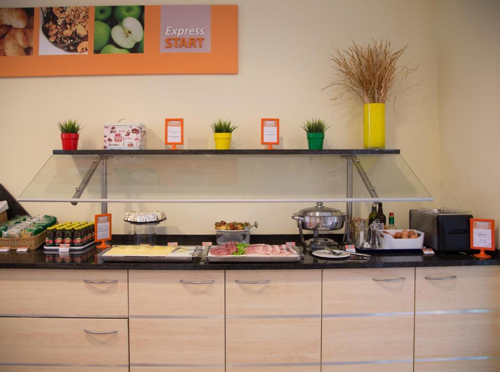 Kuchyň nebo kuchyňský kout v ubytování Holiday Inn Express Parma by IHG