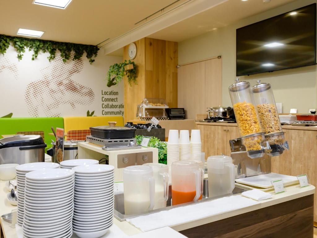 Kuchyň nebo kuchyňský kout v ubytování Hotel Econo Fukui Station