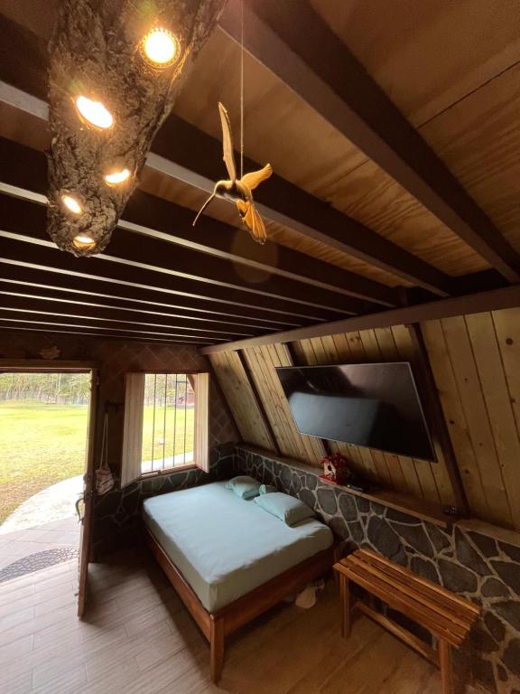 Postel nebo postele na pokoji v ubytování Cabañas La Encantada