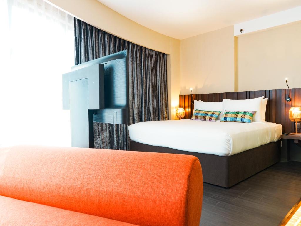 Postel nebo postele na pokoji v ubytování Starus Hotel Bukit Bintang