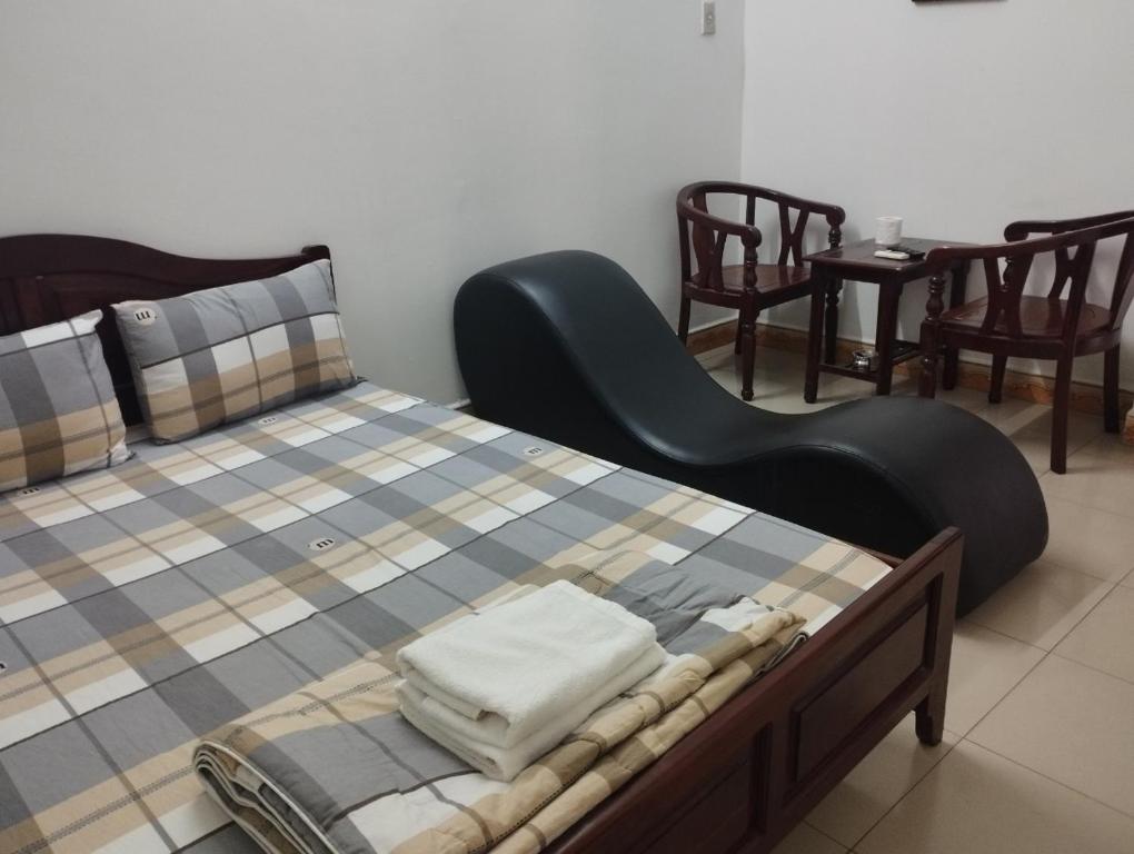 Postel nebo postele na pokoji v ubytování Sứ Lạng Hotel