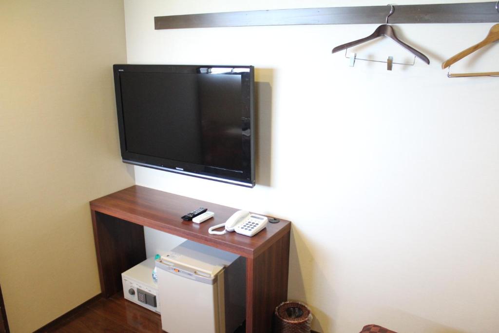 TV a/nebo společenská místnost v ubytování Hotel Shiosai