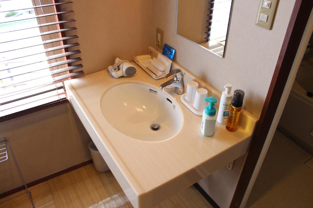 Koupelna v ubytování Hotel Shiosai