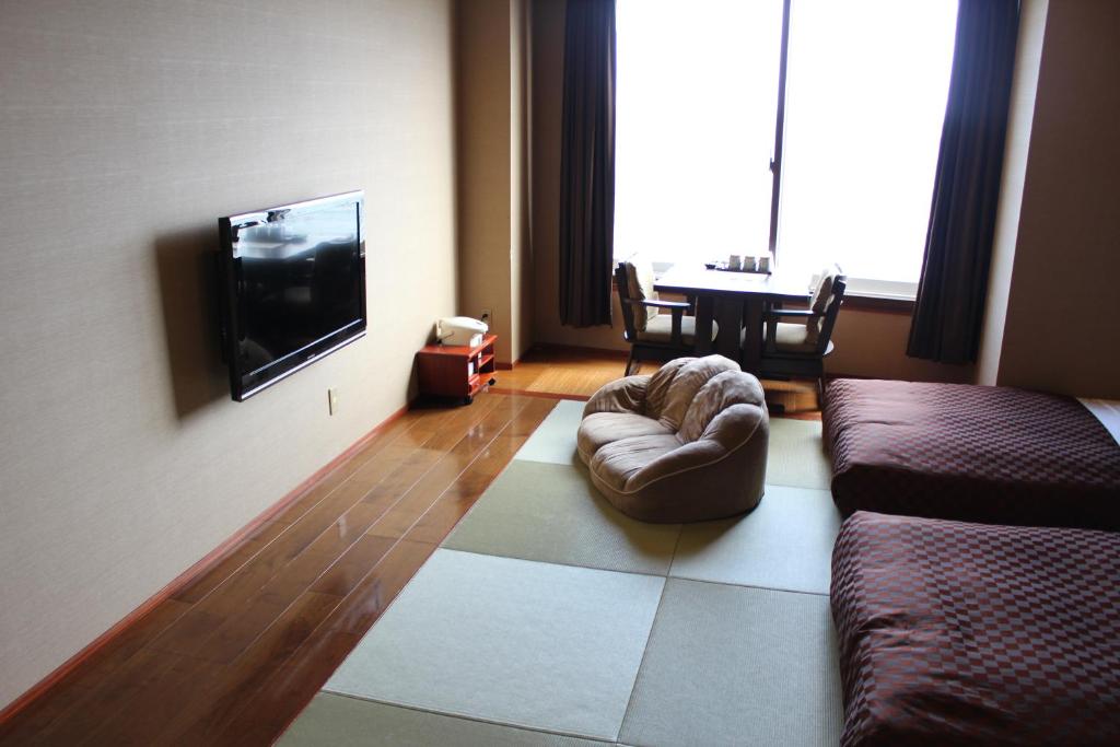 TV a/nebo společenská místnost v ubytování Hotel Shiosai