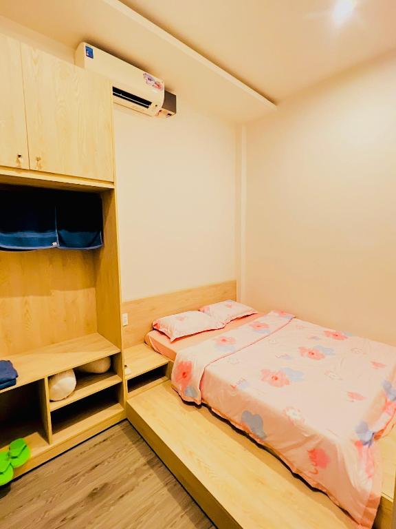 Postel nebo postele na pokoji v ubytování Villa Quy Nhơn Gần Biển Gần Trung Tâm - Biệt Thự Quy Nhơn Gần Biển