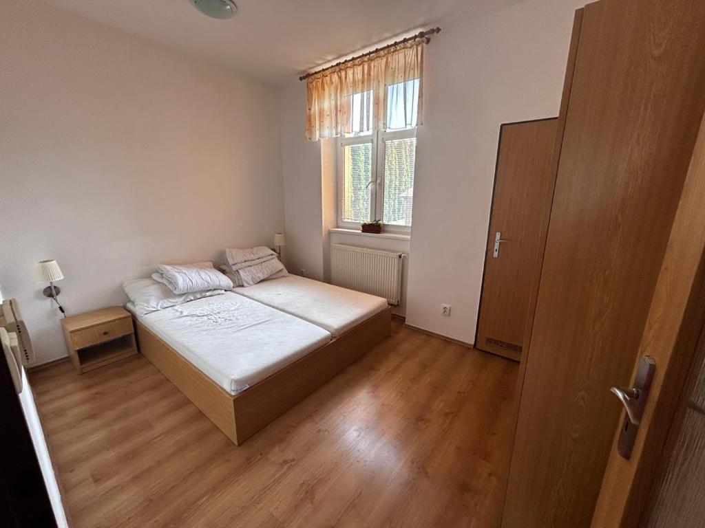 Postel nebo postele na pokoji v ubytování Ubytovna Dolní Dunajovice