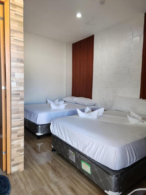 Maya Suites Badian powered by Cocotel - Luxe Viervoudige Kamer