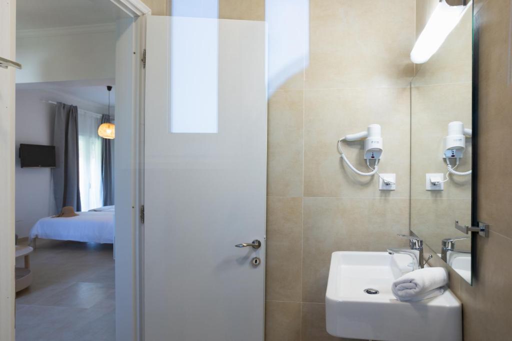 Koupelna v ubytování Hotel Bretagne